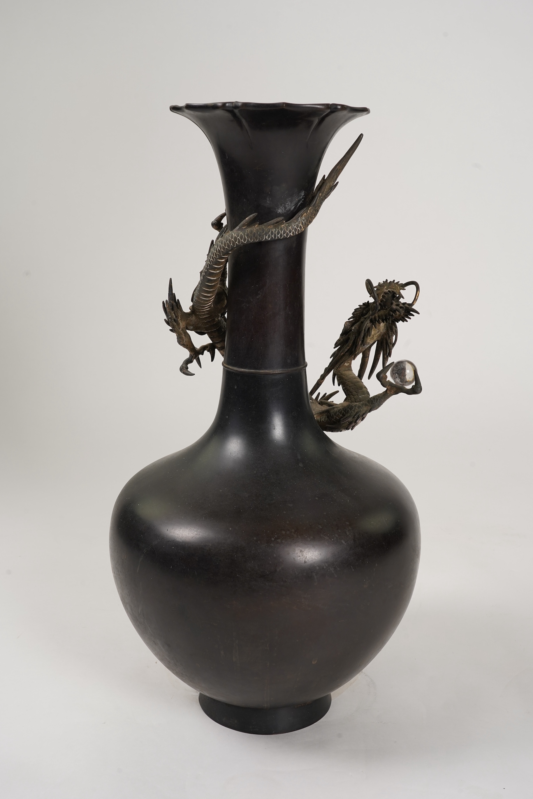 A massive Japanese bronze ‘dragon’ bottle vase, Meiji period